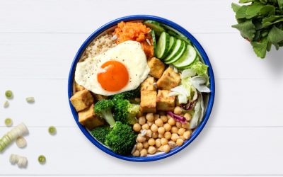 Sesame tofu quinoa bowl with fried egg